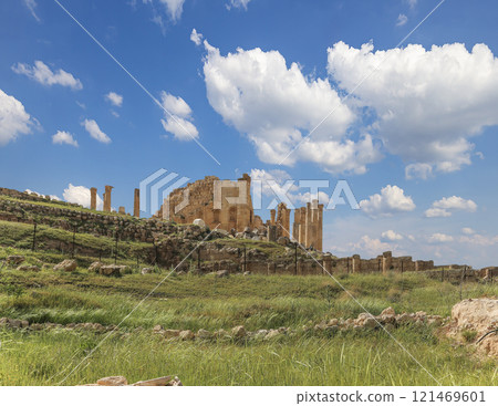 Roman ruins (against the background of a beautiful sky with clouds) in the Jordanian city of Jerash (Gerasa of Antiquity), capital and largest city of Jerash Governorate, Jordan Roman ruins (against the background of a beautiful sky with clouds) in the Jordanian city of Jerash (Gerasa of Antiquity), capital and largest city of Jerash Governorate, Jordan 121469601