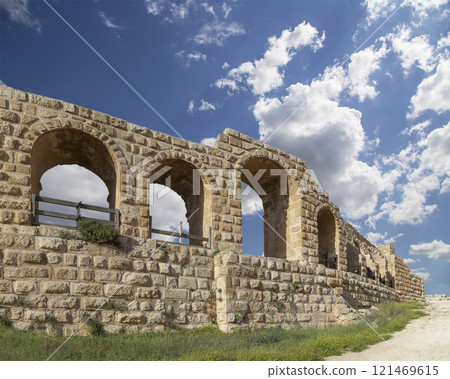 Roman ruins (against the background of a beautiful sky with clouds) in the Jordanian city of Jerash (Gerasa of Antiquity), capital and largest city of Jerash Governorate, Jordan Roman ruins (against the background of a beautiful sky with clouds) in the Jordanian city of Jerash (Gerasa of Antiquity), capital and largest city of Jerash Governorate, Jordan 121469615