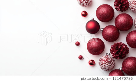 Red christmas ornaments on a white background, festive holiday decoration concept 121470786