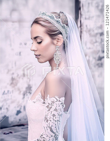 The image features a woman dressed in a vintage-style bridal look,complete with a white lacy corset and a decorative headpiece,set against a gritty, urban background 121471426