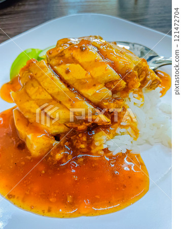 Crispy pork rice, Chinese crispy pork with rice and sauce. 121472704
