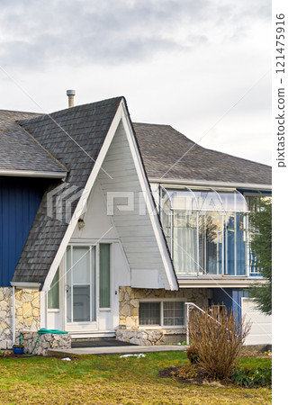 Entrance of original residential house with lighthouse over patio 121475916