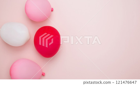 Birthday attributes colorful balloons. Concept of festive birthday celebrations 121476647