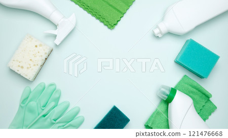 Concept of cleanliness and hygiene. Cleaning supplies and tools, including bottles, gloves, sponges, cloths Concept of cleanliness and hygiene. Cleaning supplies and tools, including bottles, gloves, sponges, cloths 121476668