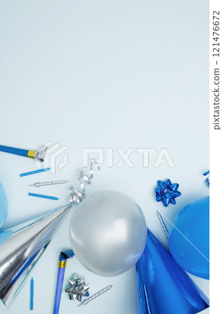 Concept of festive birthday celebrations. Birthday attributes colorful balloons, party hats, candles, confetti Concept of festive birthday celebrations. Birthday attributes colorful balloons, party hats, candles, confetti 121476672