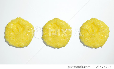 Cosmetic smear. Smears of body scrub on white background. Fruit and berry body scrub texture of swatch 121476702