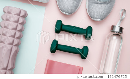 Athlete's equipment set dumbbells, resistance band, foam roller for Myofascial release. Healthy lifestyle 121476725