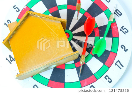 House model with the dartboard with target success , Loan for real estate or saving money for house. 121478226