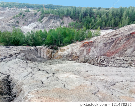 Quarry for the extraction of multi-colored clay Quarry for the extraction of multi-colored clay 121478255