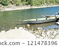 Fishing boat on the shore of the lake in the summer 121478396