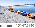 Colorful row boats on the beach of a small island in the Baltic Sea 121478449