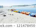 Colorful rowboats on the beach 121478450