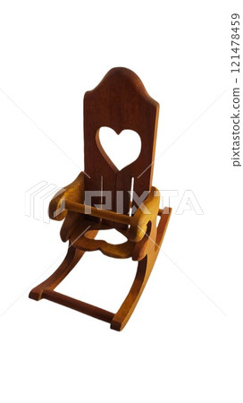 Miniature rocking chair toy on white background 121478459