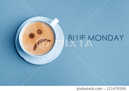 Sad upset face on coffee foam. Blue Monday. 121478500
