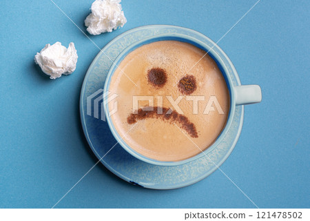Blue Monday. Unhappy coffee with upset face Blue Monday. Unhappy coffee with upset face 121478502