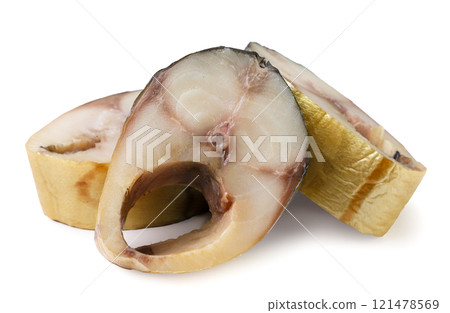 Pieces of smoked mackerel on a white background. Isolated Pieces of smoked mackerel on a white background. Isolated 121478569