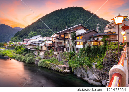 Gujo Hachiman, Japan hot springs town at dusk over the Yoshida River.  Gujo Hachiman, Japan hot springs town at dusk over the Yoshida River.  121478634