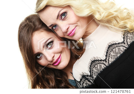 Adult mother and daughter portrait 121478761