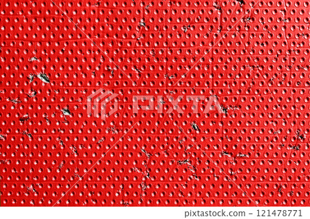 Red aged textured ripped surface with dotted pattern and torn distressed details. Industrial worn scratched color background Red aged textured ripped surface with dotted pattern and torn distressed details. Industrial worn scratched color background 121478771