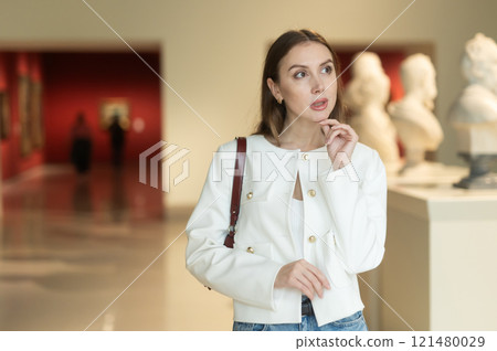 Girl view sculpture in museum hall Girl view sculpture in museum hall 121480029