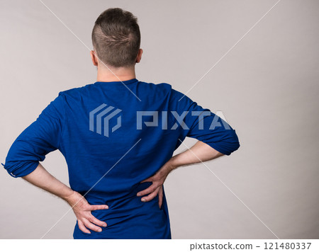 Man having back loins pain ache 121480337
