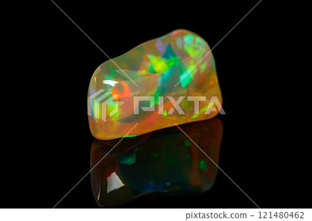 macro mineral stone rare and beautiful opals on a black background macro mineral stone rare and beautiful opals on a black background 121480462