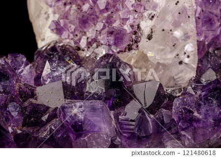 macro mineral amethyst stone with calcite black background 121480618