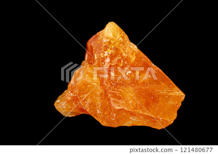 macro mineral stone Scheelite on a black background macro mineral stone Scheelite on a black background 121480677