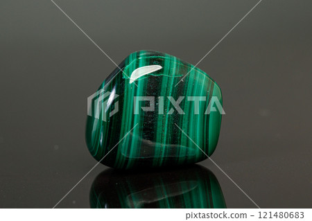 macro mineral stone malachite on a black background 121480683