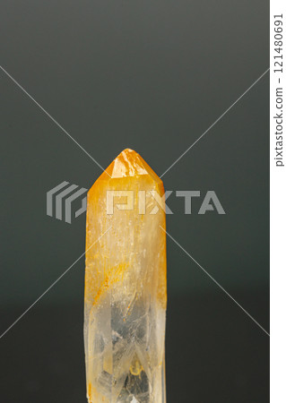 macro mineral quartz stone with halloysite, mango quartz on a black background macro mineral quartz stone with halloysite, mango quartz on a black background 121480691
