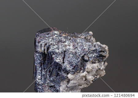 macro mineral Acanthite stone on a black background 121480694