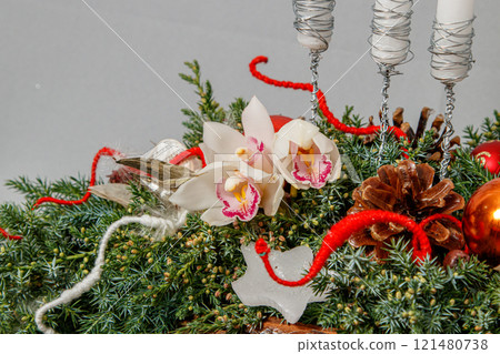 Christmas composition of flowers and Christmas decorations 121480738