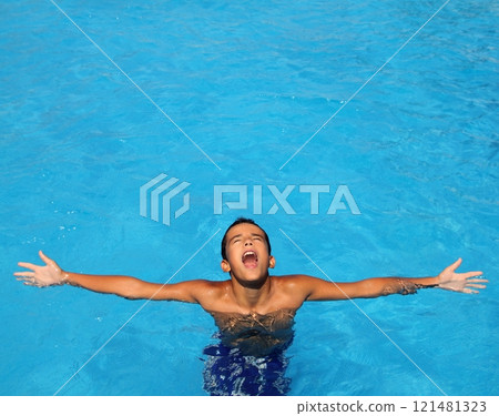 boy teenage relaxed open arms blue swimming pool boy teenage relaxed open arms blue swimming pool 121481323