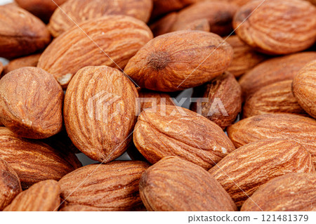 macro almond nuts on a white background macro almond nuts on a white background 121481379