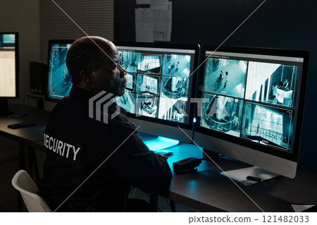 Man working in observation room 121482033