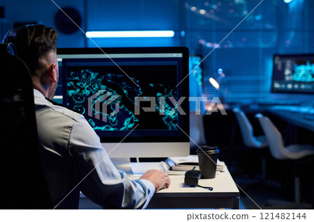 Officer in uniform using computer Officer in uniform using computer 121482144