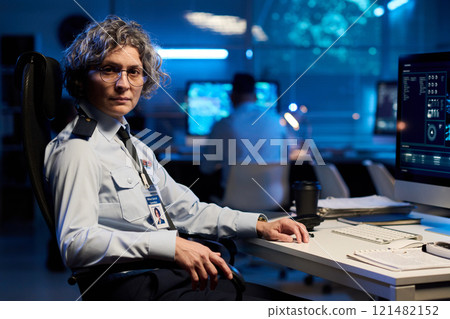 Experienced female officer in uniform Experienced female officer in uniform 121482152