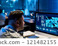 Officer looking at computer screen 121482155
