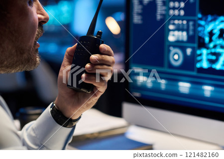 Officer with portable radio transmitter 121482160