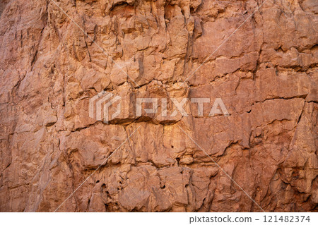 Fragment of a sandstone wall of Red canyon in Israel Fragment of a sandstone wall of Red canyon in Israel 121482374