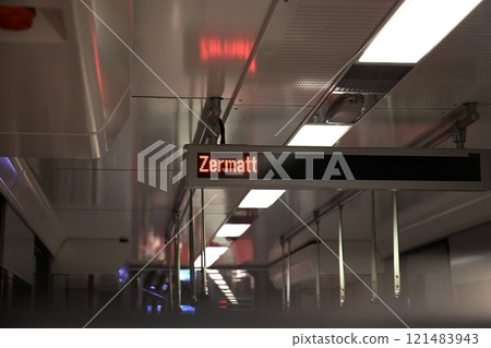 Traveling on Swiss train next station screen Zermatt Traveling on Swiss train next station screen Zermatt 121483943