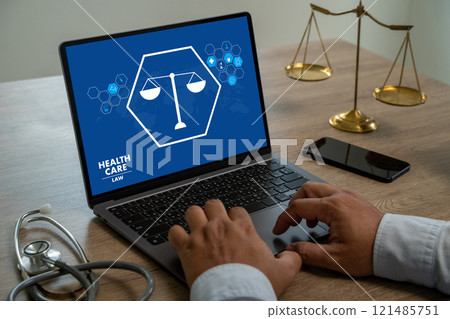 health care law doctor using a laptop Fair and ethical medical practice 121485751