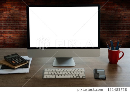 man working Businessman using a desktop computer of the blank screen at the wooden working desk. 121485758