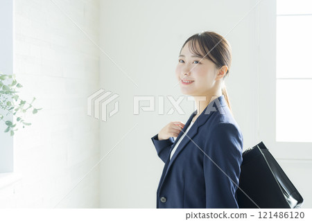 Young business woman with a smile 121486120
