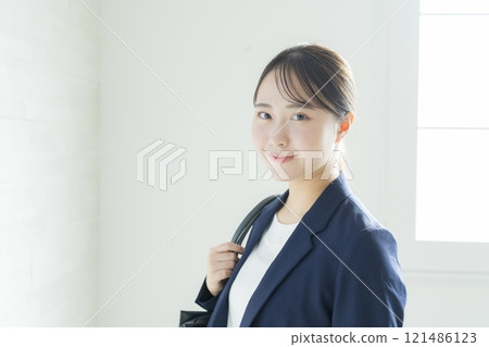 Young business woman with a smile 121486123