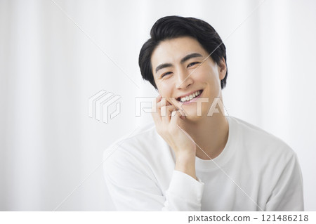 Thinking young man 121486218