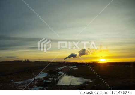 Sunset and artificial smoke over the empty northern land Sunset and artificial smoke over the empty northern land 121486276