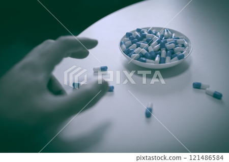 Overdose, OD image, hand injecting a large amount of medicine, drug overdose, stress, depression, young people, social problem 121486584