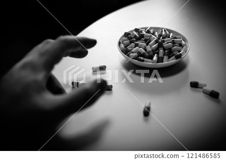 Overdose, OD image, hand injecting a large amount of medicine, drug overdose, stress, depression, young people, social problem 121486585