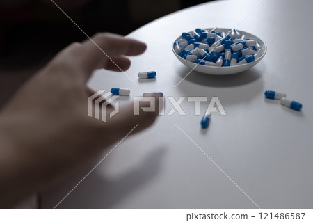 Overdose, OD image, hand injecting a large amount of medicine, drug overdose, stress, depression, young people, social problem 121486587